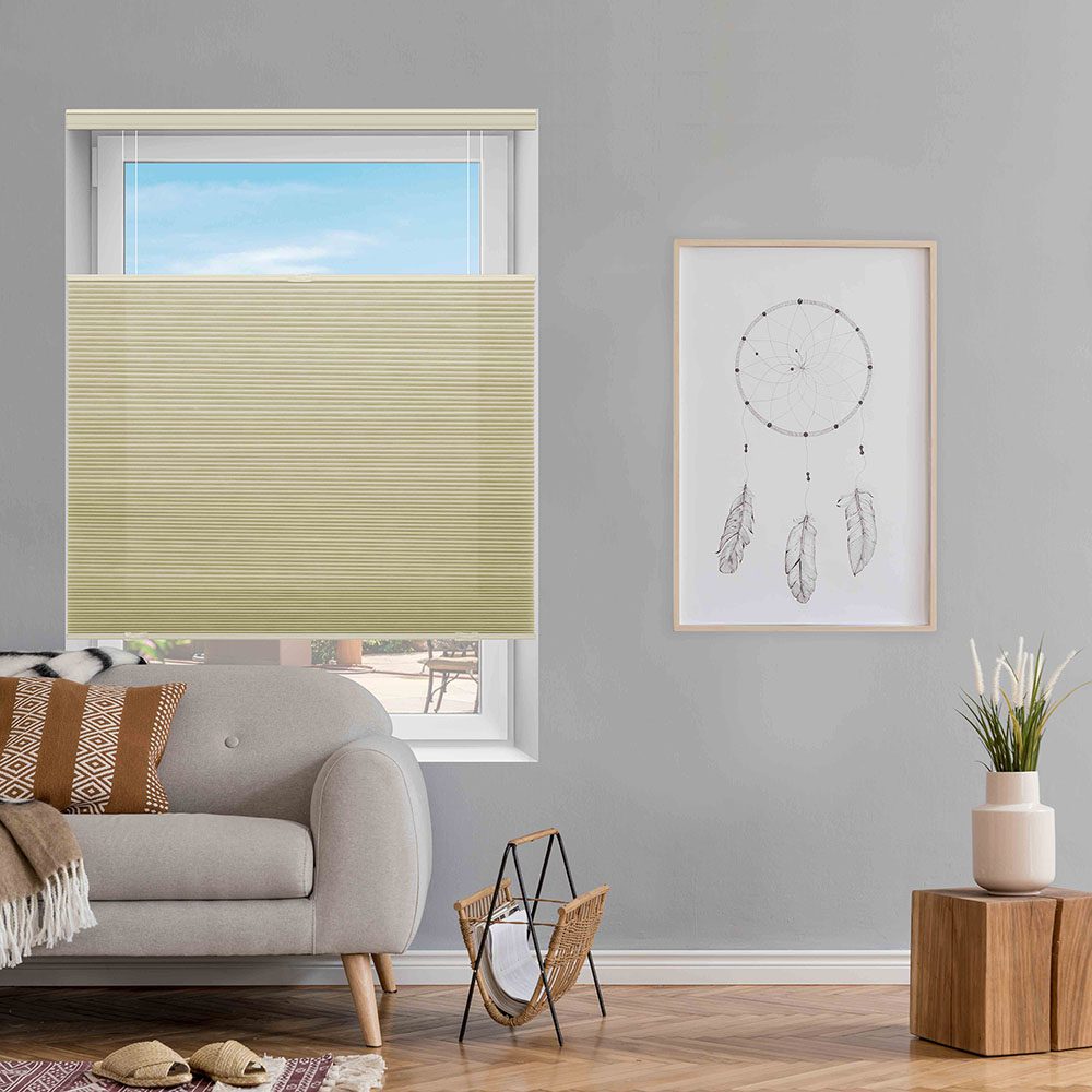 Southwest-styled living room with Tranquil Cordless Light Filtering Cellulars in Basic Beige from SelectBlinds