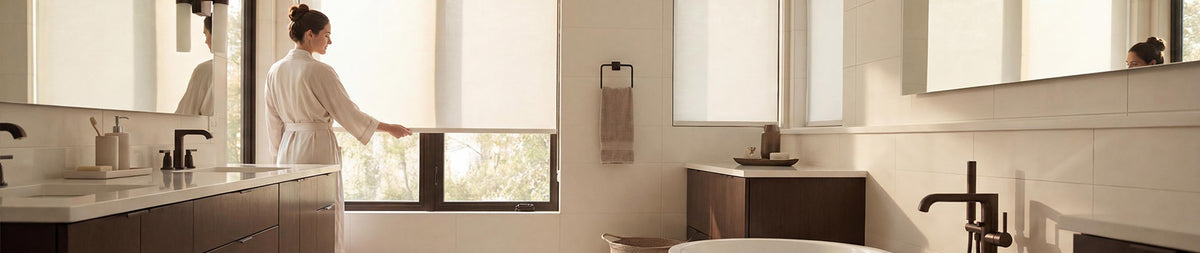 Image of a woman opening blinds in a bathroom