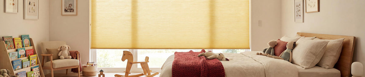 Image of light filtering cellular shades in a childrens room