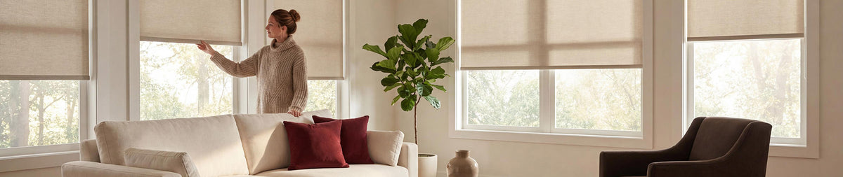 Image of a woman opening blinds in a living room